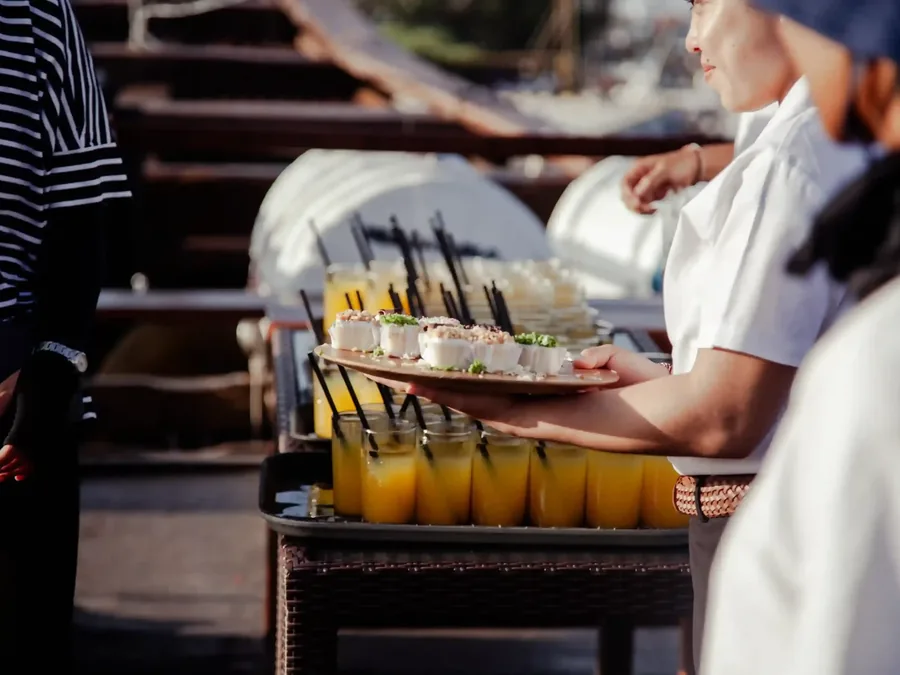 Welcome drinks being carried out on a tray in Bali